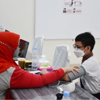 Vaksinasi Massal Covid-19 untuk Pelajar